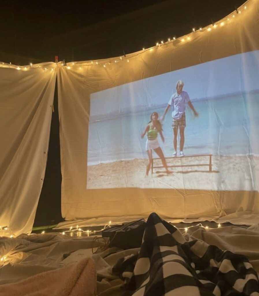 How We Created a Trampoline Movie Night With Sheets and a Projector